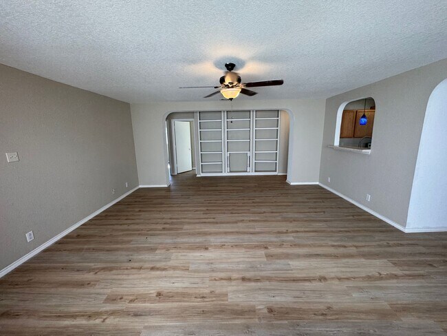 Building Photo - NEW PAINT, FLOORING, APPLIANCES & ROOF  | ...