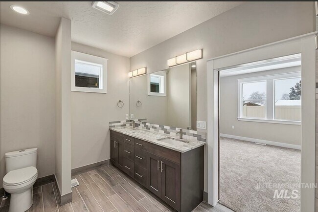 Building Photo - Beautiful Custom Single Level Boise Home A...