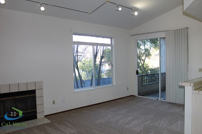 Building Photo - $2,595 - Upstairs 2 Bedroom/1 Bath Condo