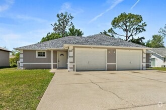 Building Photo - Spacious 3 Bedroom 2 Bath 1 Car Duplex in ...