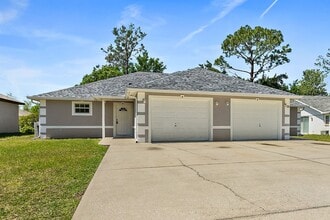 Building Photo - Spacious 3 Bedroom 2 Bath 1 Car Duplex in ...