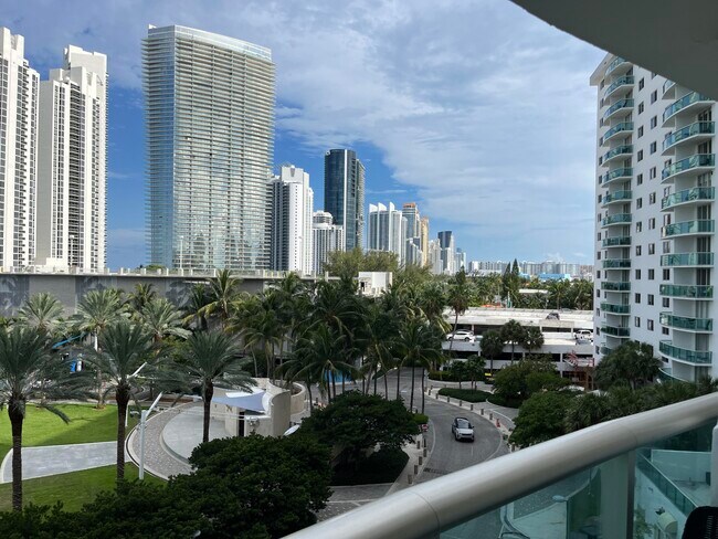 Building Photo - 19370 Collins Ave