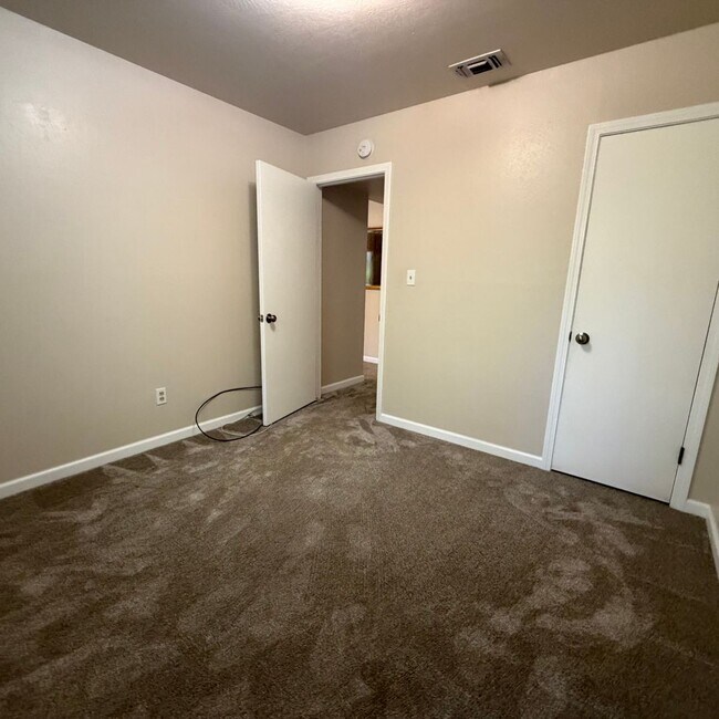 Building Photo - Adorable house with large deck,  yard and RV access