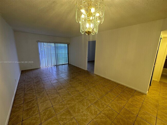 Building Photo - 8560 N Sherman Cir