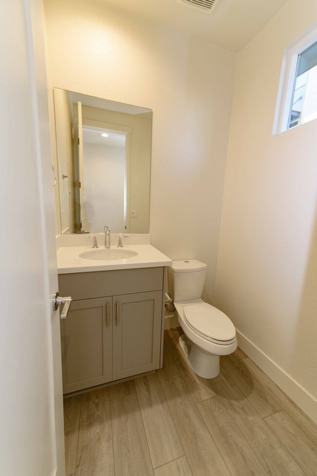 Building Photo - Experience contemporary urban living at its finest. Private Garage & Dual Suites!