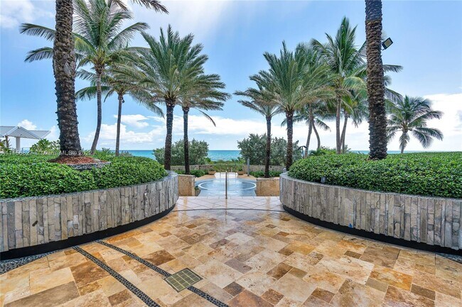 Building Photo - 6899 Collins Ave