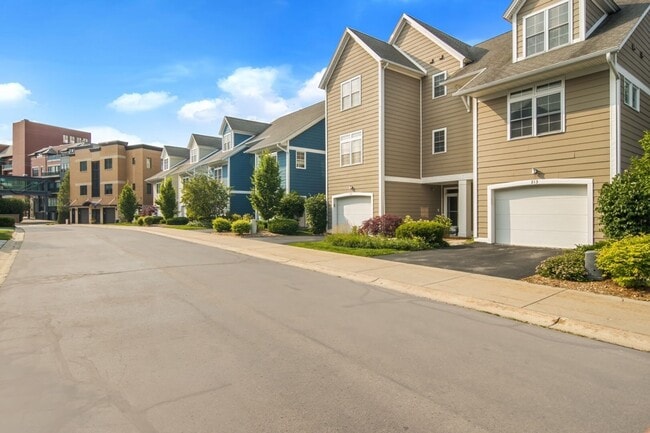 Building Photo - Furnished Pet-Friendly 30-Day Extended Stay Riverfront Condo