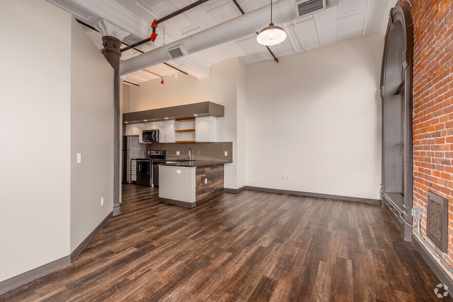 1BR, 1BA - 618SF - Living Room - Historic Character. Modern Living.
