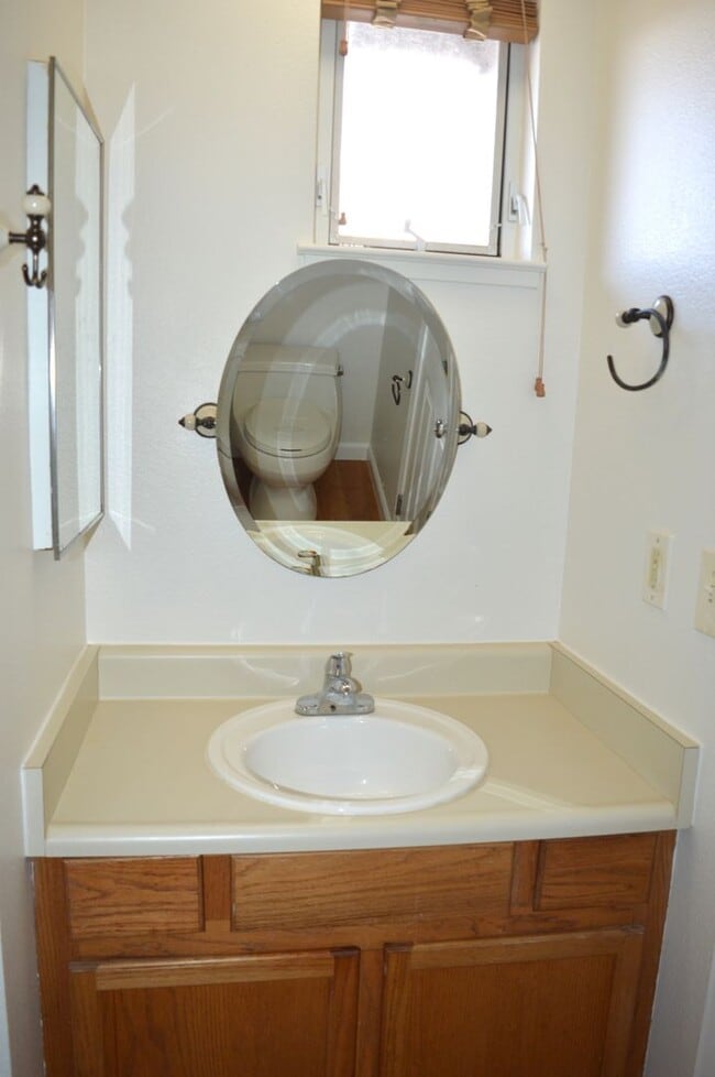 Building Photo - Spacious Three-Bedroom Two-Story Townhome with Garage and Private Yard