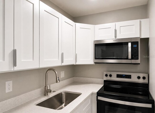 Building Photo - 9160 Lake Chase Island Way