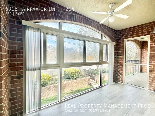 Building Photo - Bright, Beautiful Condo with Sunroom & Bal...