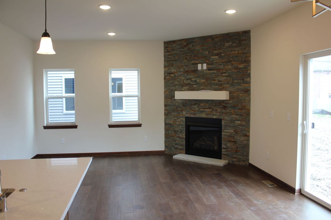Living room with fireplace - 9019 W Stuth Ave