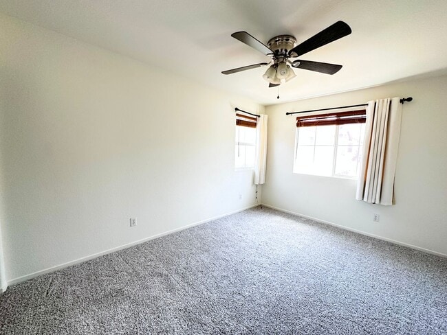 Building Photo - 4 bedroom home. New Carpet!
