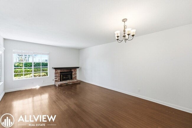 Building Photo - Fully Renovated 2 Bed Townhome with Private Patio, 2-Car Garage & Community Pool