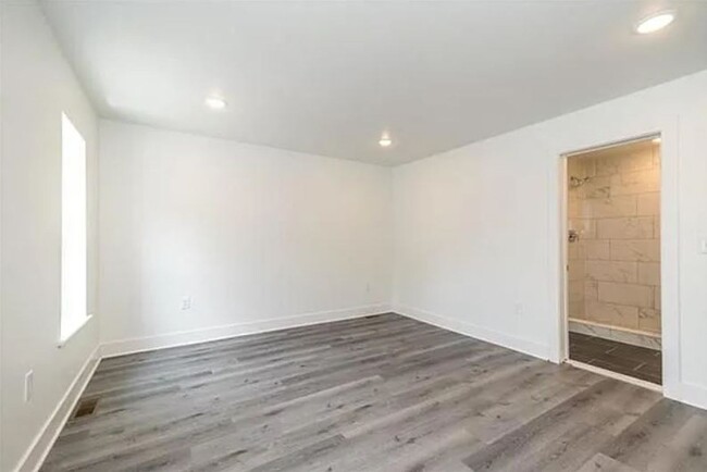 Building Photo - Brand New 4 Bedroom / 3.5 Bathroom Townhom...