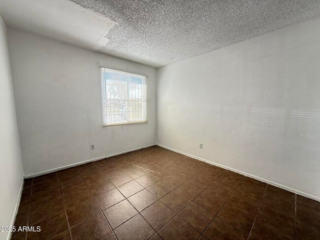 Building Photo - 3646 N 69th Ave