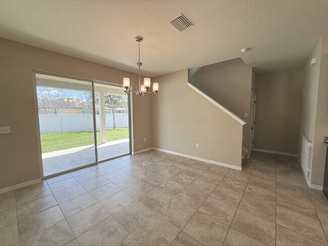Building Photo - Spacious 4-Bedroom Retreat with additional office/den in the Heart of Trinity!