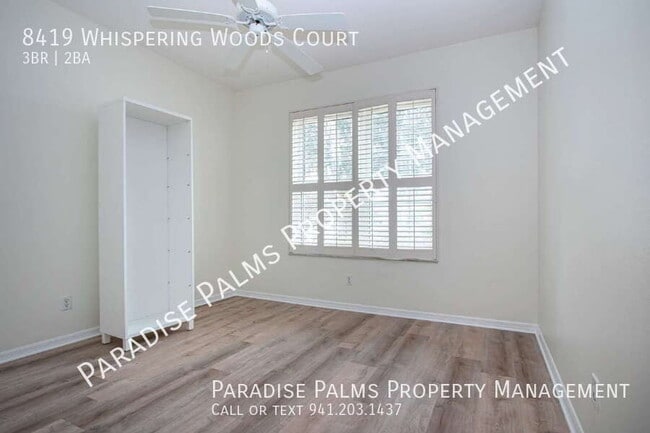 Building Photo - 8419 Whispering Woods Ct