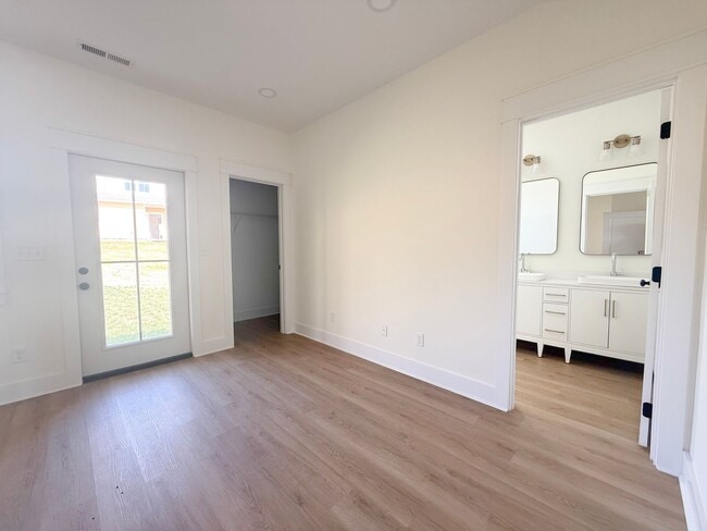 Building Photo - The Garrett | 3-Bedroom Home with Pool and Pickleball Court at Highbury