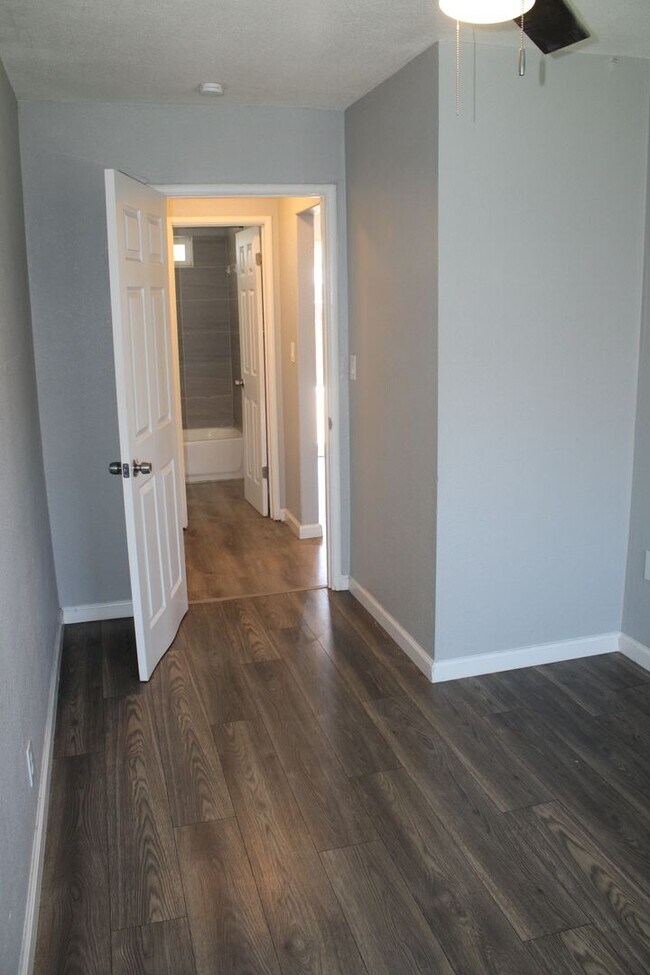 Building Photo - Two Bedroom plus BONUS Room in Pittsburg Single Story Four-plex- OPTIONAL DETACHED GARAGE AVAILABLE!