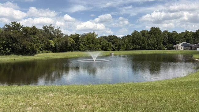 Building Photo - "Stunning 4-Bedroom Lake View Home in Oviedo – Spacious 2,132 Sq Ft Retreat!"