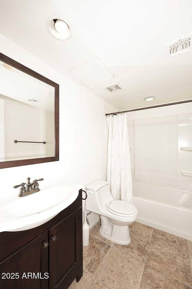 Building Photo - 7910 E Camelback Rd