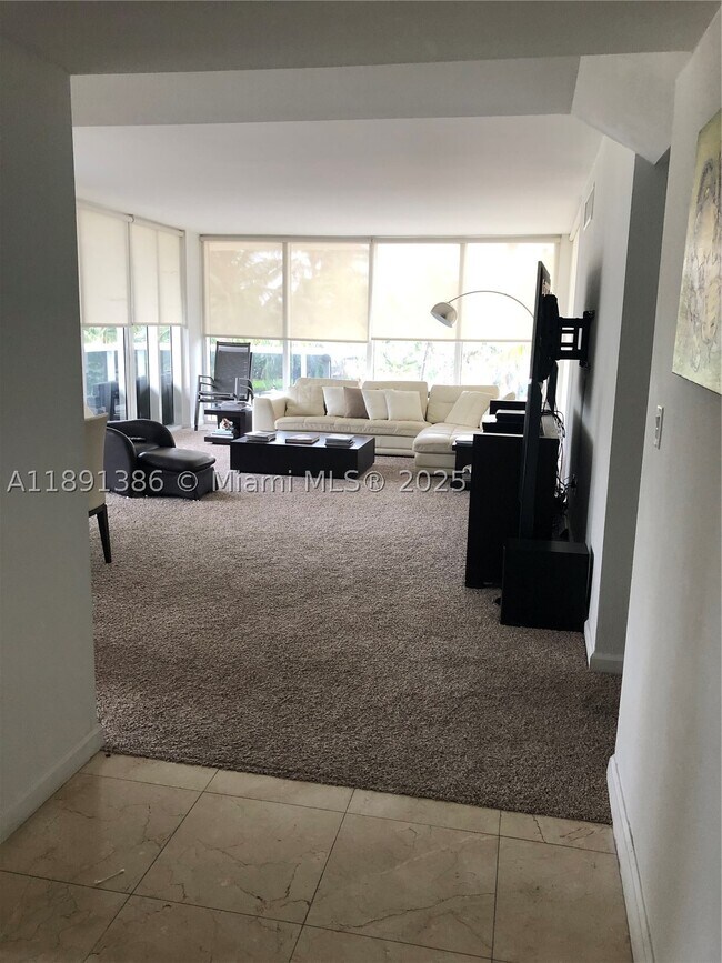 Building Photo - 10275 Collins Ave
