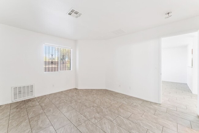 Building Photo - Modern Gated Condo Near the Strip with Pool & Covered Parking!