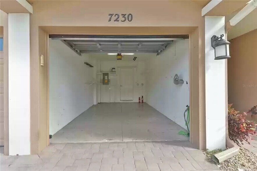 garage w/entrance to condo - 7230 Hamilton Rd