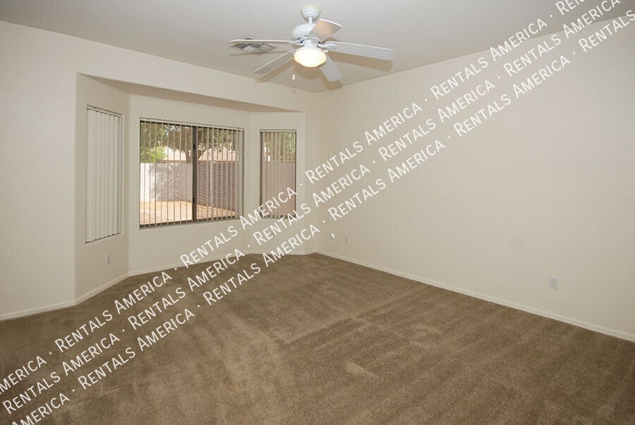 Building Photo - 4212 N 125th Ave