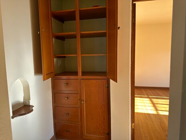 Hall cabinet between living room and bedroom - 2233 Kearney St