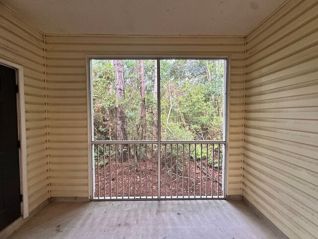 Building Photo - Stylish 2 bed, 2.5 Bath Condo in Magnolia Place | Private Garage | $1,550.00