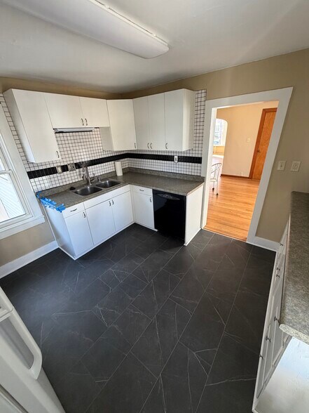 Kitchen with dishwasher and garbage disposal - 145 N Franklin St
