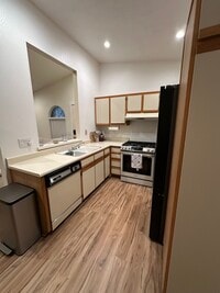 Building Photo - 7130 Woodlake Ave