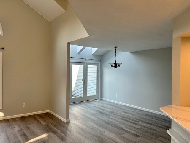 Dining Room with patio doors and skylights - 42 Pepper Ln