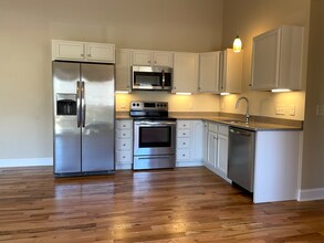 Building Photo - Downtown Morganton - One Bedroom Apt on top floor with wood floors great natural light, updated f...