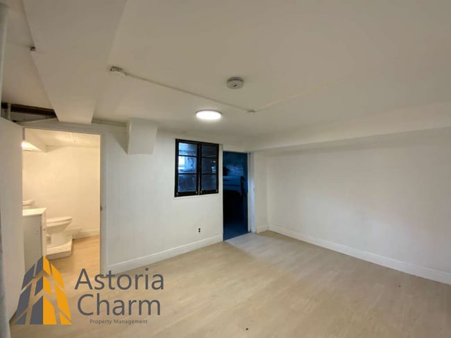 Building Photo - 2 Bed with Finished Basement, Deck off Bedroom, and Backyard