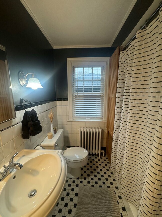 Building Photo - Charming Cape Cod Home with Updated Kitche...