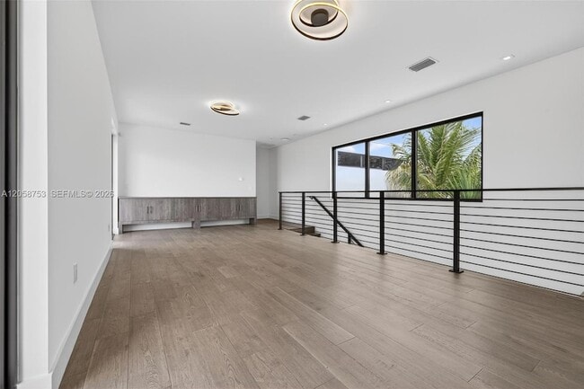 Building Photo - 16709 Botaniko Dr N