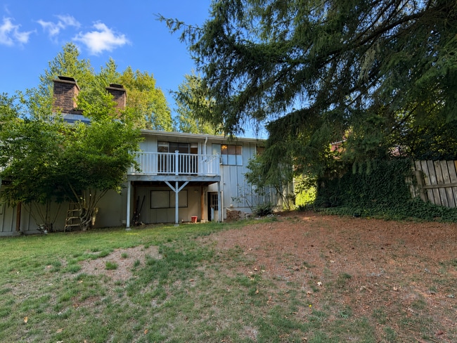 Building Photo - Beautiful Split-Level Home with Fireplace, Deck, Garage, and EV Charger