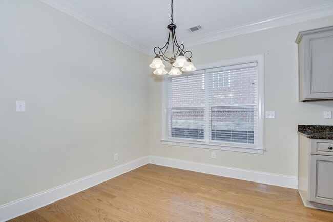 Building Photo - Heart of Evans - Landscaping Included