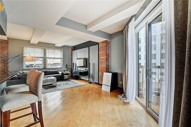 You'll love the brand new hardwoods and radiating natural light - 110 E Washington St