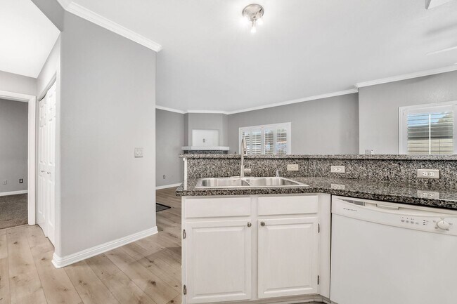 Building Photo - Light-Filled Dual-Suite Condo with Soaring Ceilings, Fireplace & Private Balcony in Amenity-Rich ...