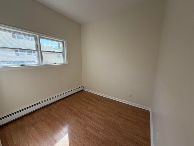 Building Photo - 369-371-371 Ave E