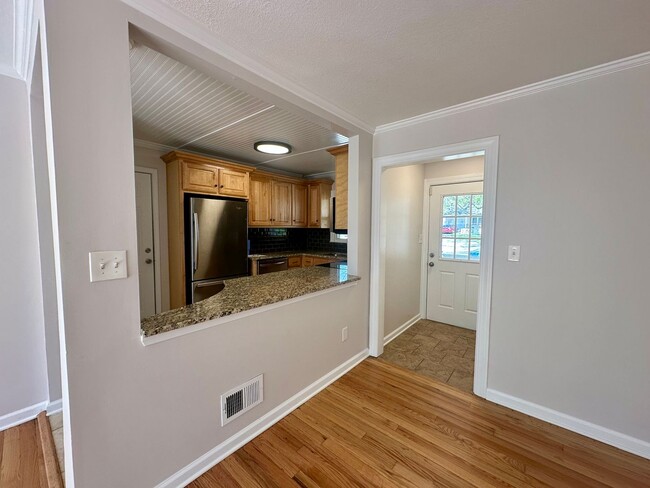 Building Photo - {5221} Updated Prairie Village Ranch + Fenced Yard + One Car Garage