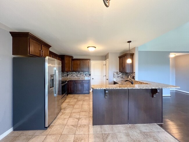 Building Photo - Gorgeous Single-Family--Fenced Backyard and Bonus Room!