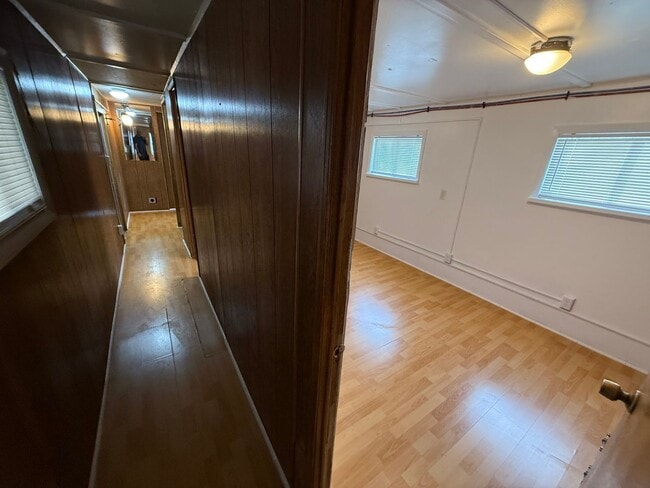 Building Photo - 2 Bedroom 1.5 Semi-Rural Mobile Home with Workshop on Large Lot