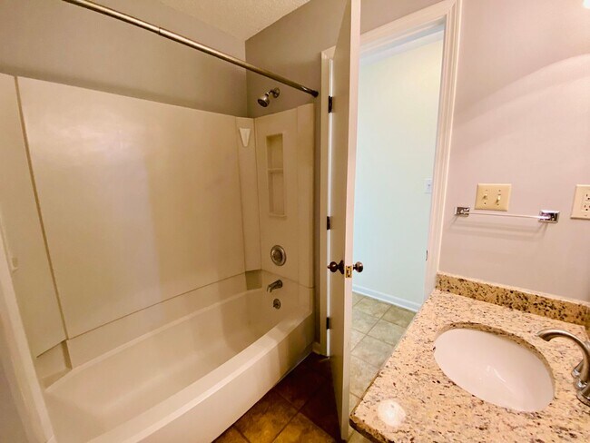 Building Photo - {12030 - F}  Updated Condo in Fantastic Location + Top Floor + Covered Parking Included + Private...