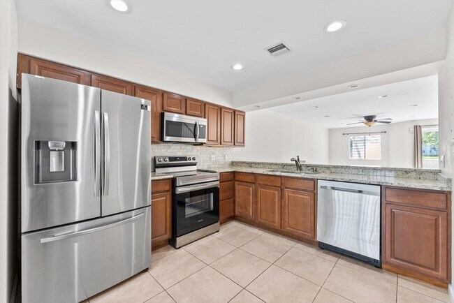 Building Photo - 6214 Riverwalk Ln