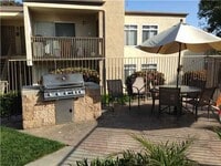 Building Photo - Charming 1-Bedroom Condo with Park-Like Views in Gated Community
